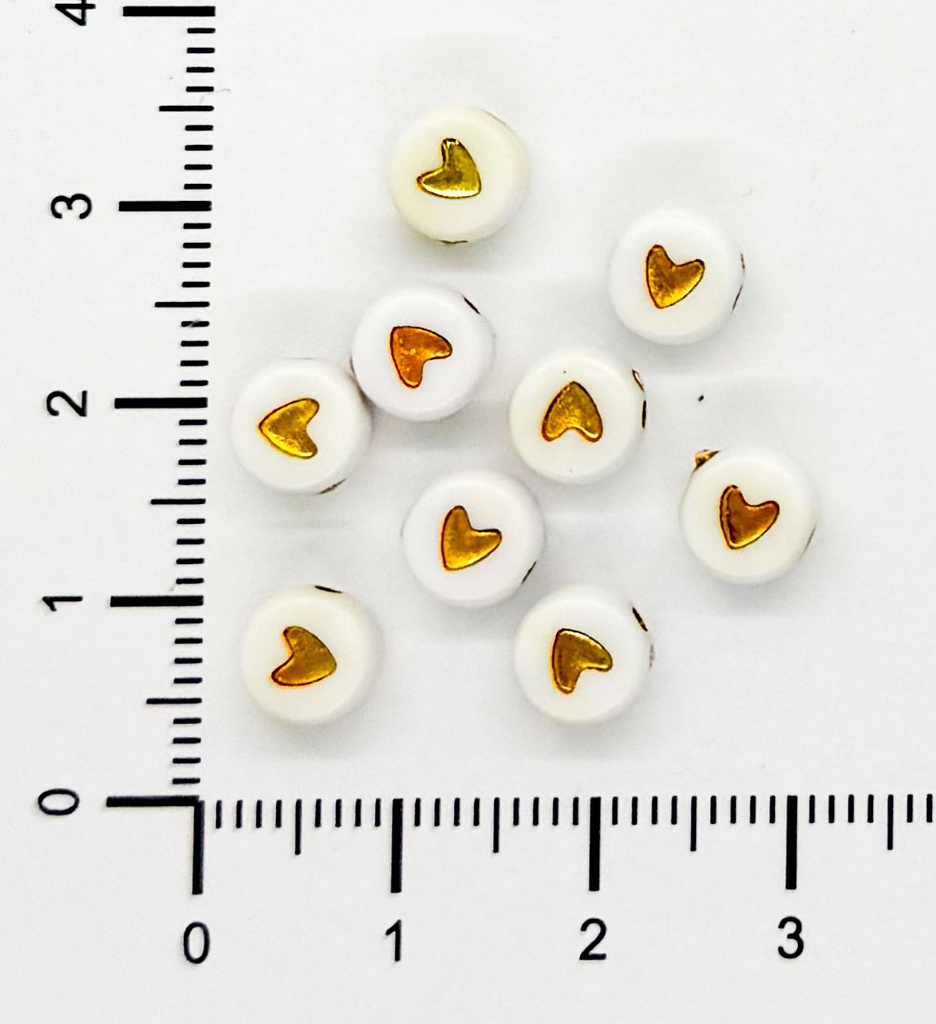 Corazón plano 7mm blanco c/dorado x 10 gr.