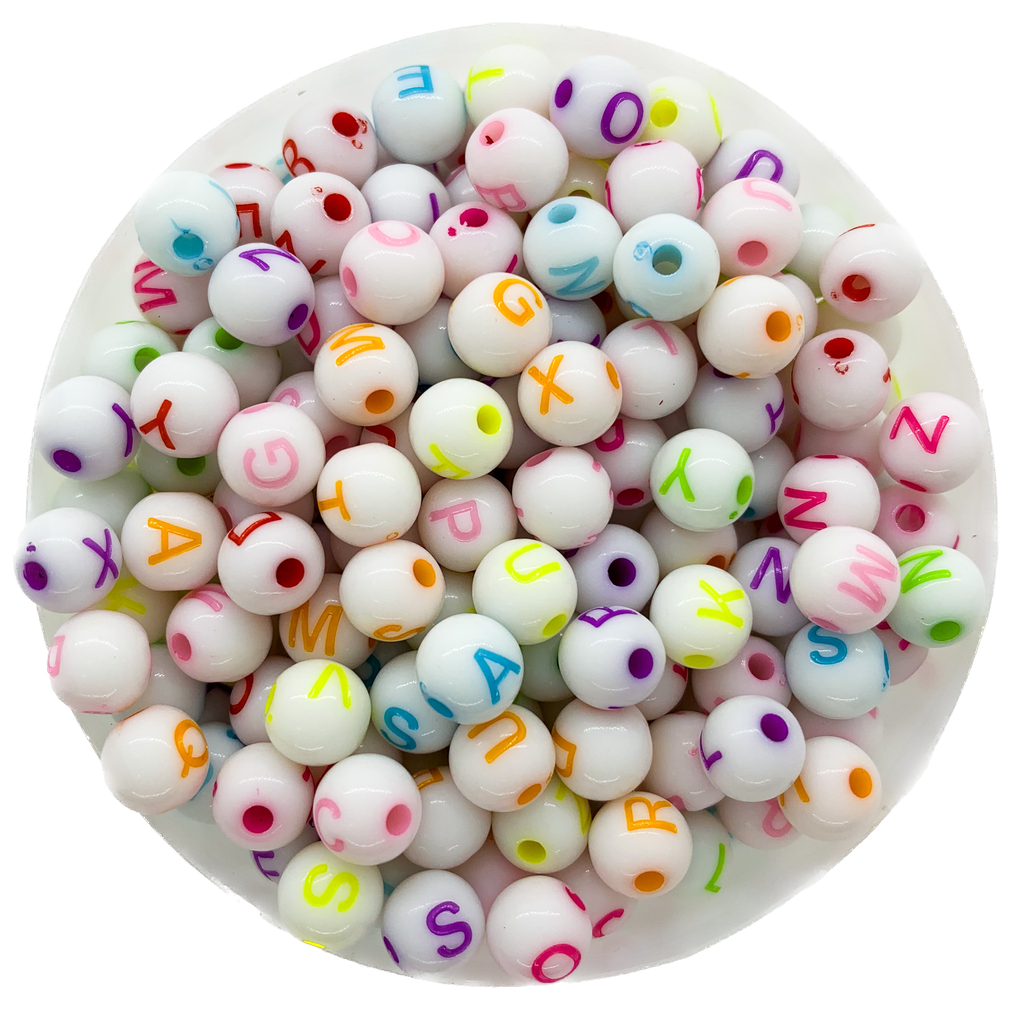 Plástico letras bolitas 8mm blancas y color x 10gr.