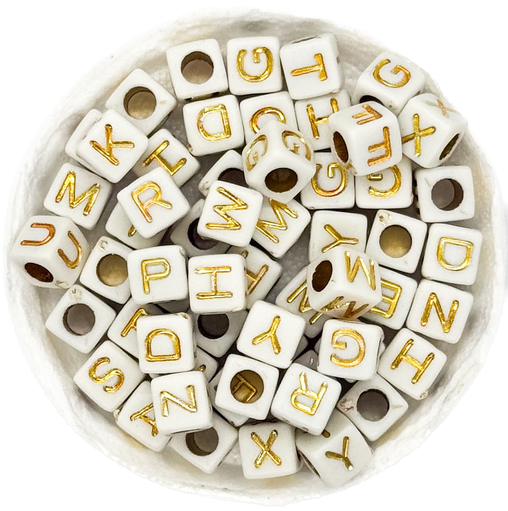 Plástico letras cubo 7x7mm blanca c/dorado x 10grs.