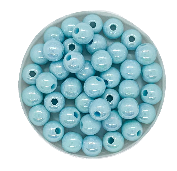 Perla plástica nacarada AB 8mm celeste x 10gr   