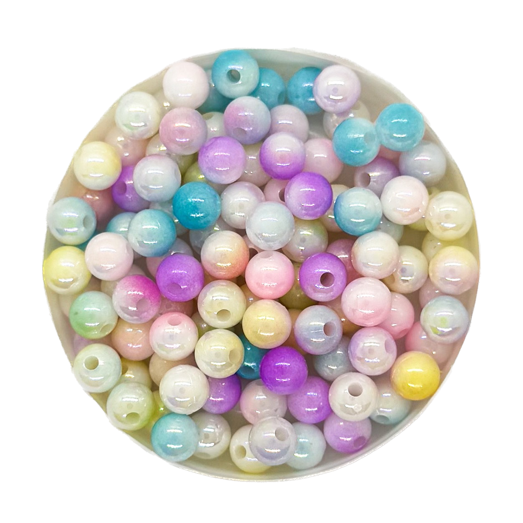 Perla plástica marmolada 6mm multicolor x 10g